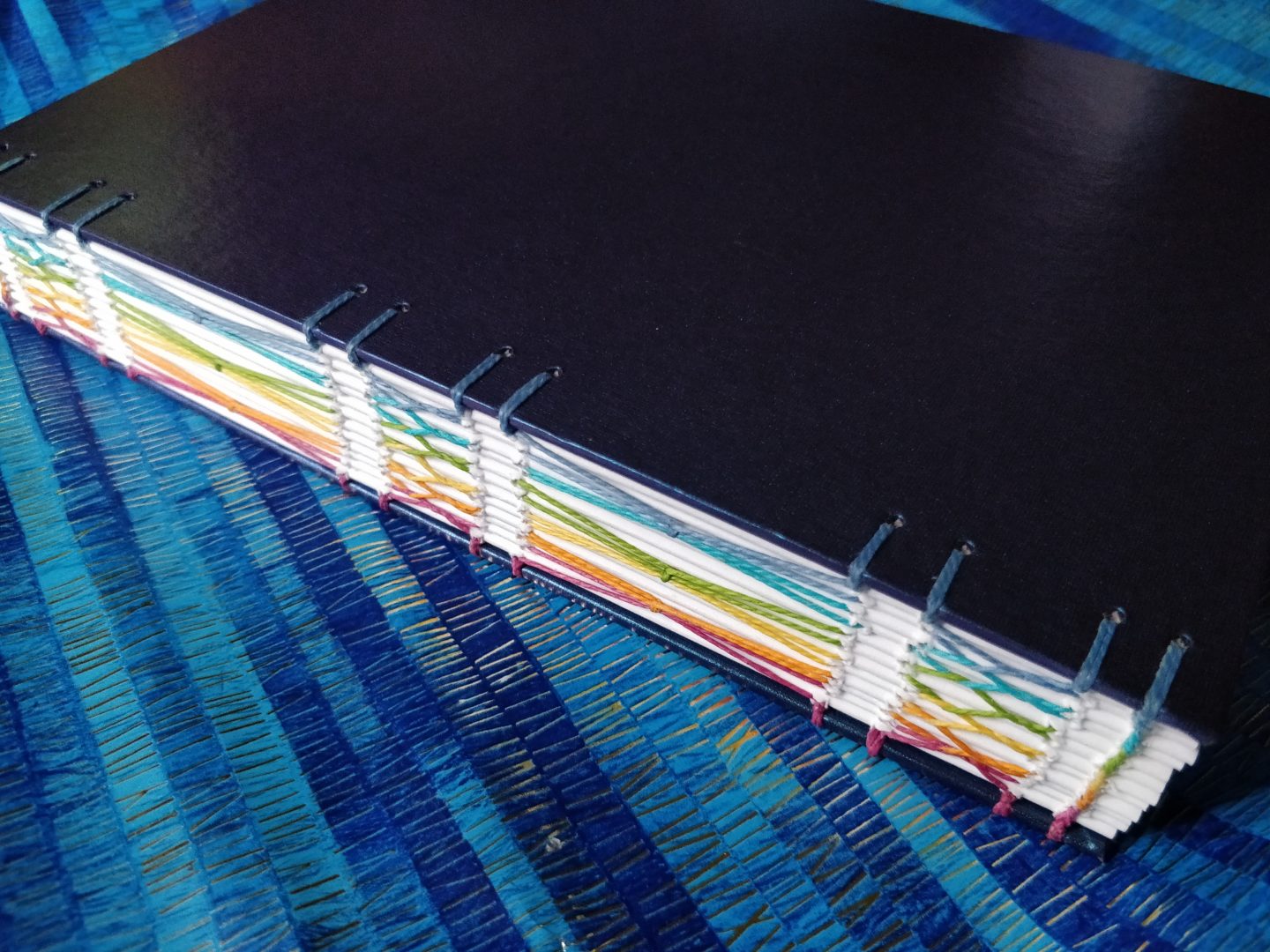 Avalon Rainbow Notebook from The Citrus Book Bindery Rainbow Stitching