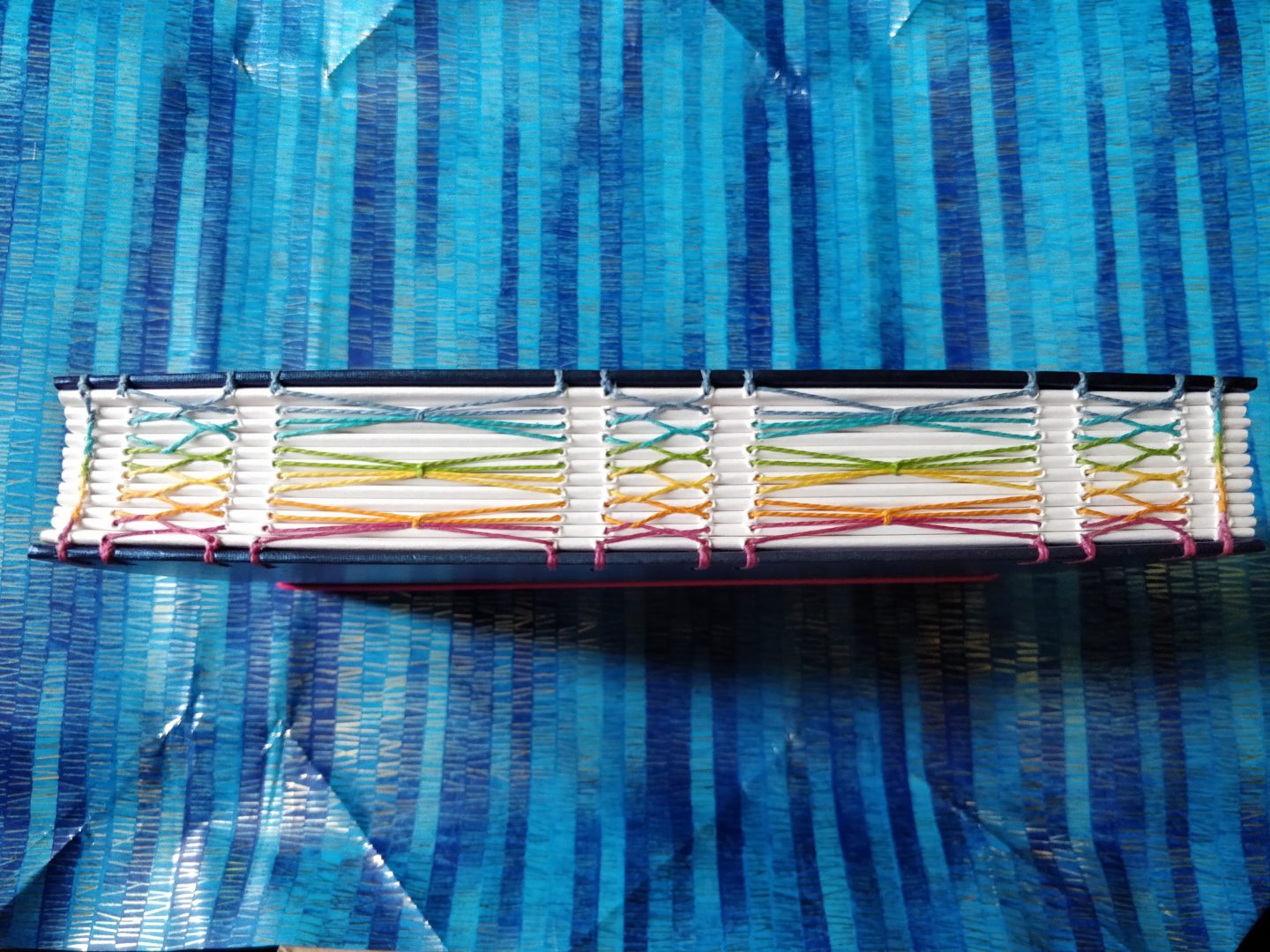 Avalon Rainbow Notebook from The Citrus Book Bindery Rainbow Stitching on Spine