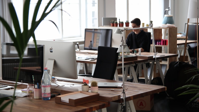 a modern office with furniture and computers