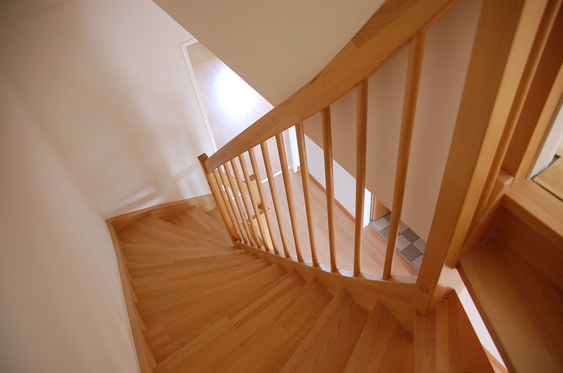 wooden staircase leading down from first floor