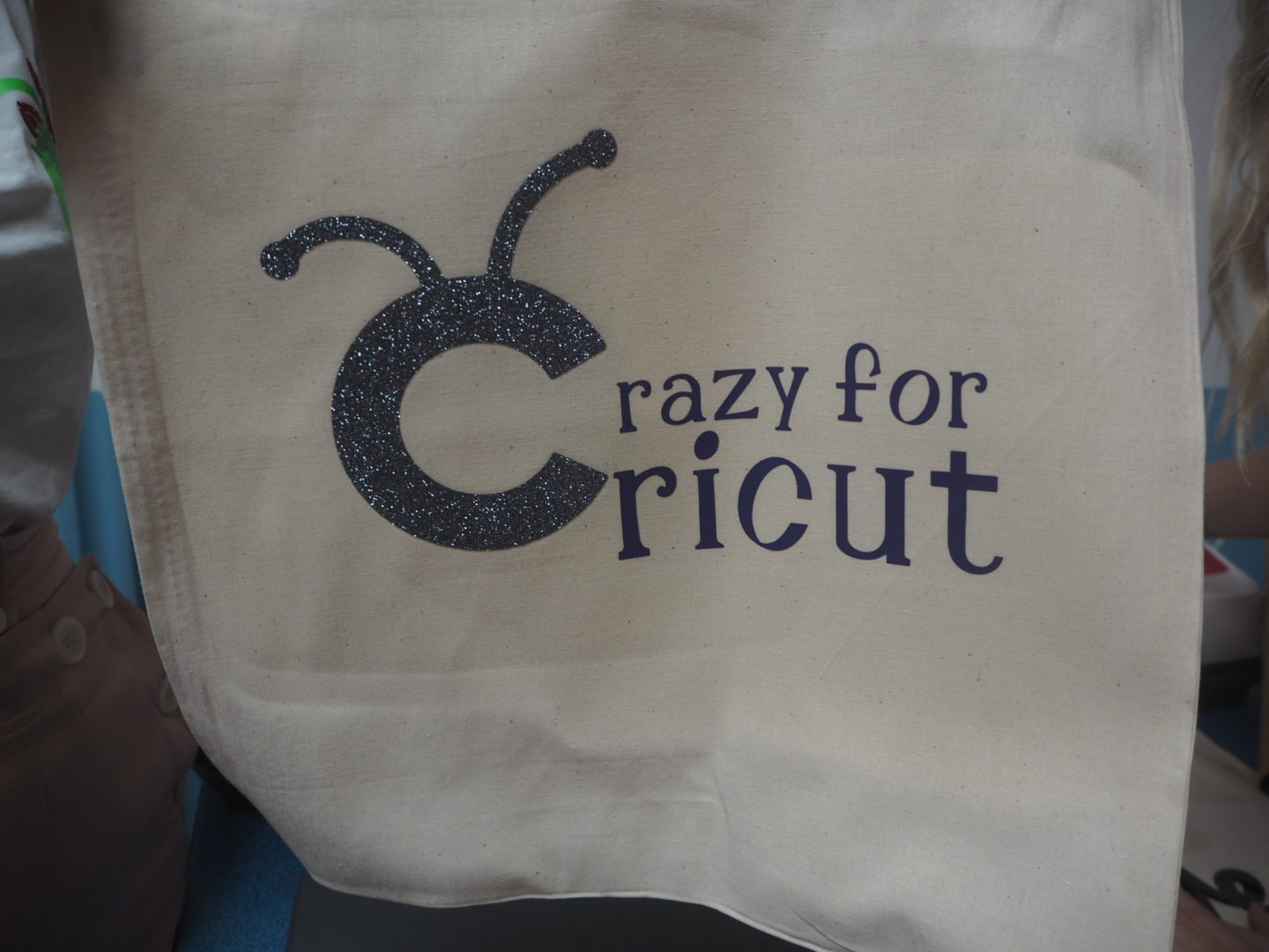 Finished tote bag decorated with iron on vinyl applied with Cricut EasyPress 2 Raspberry 9" x 9"