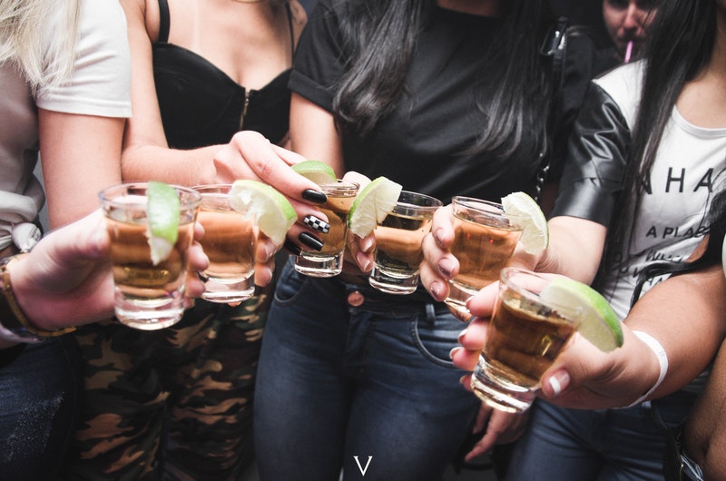 a group of women drinking