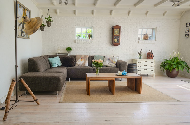 a spacious cosy lounge with sofa